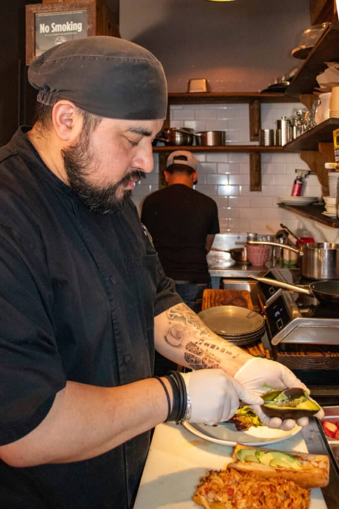 chef preparing delicious food at couleur cafe