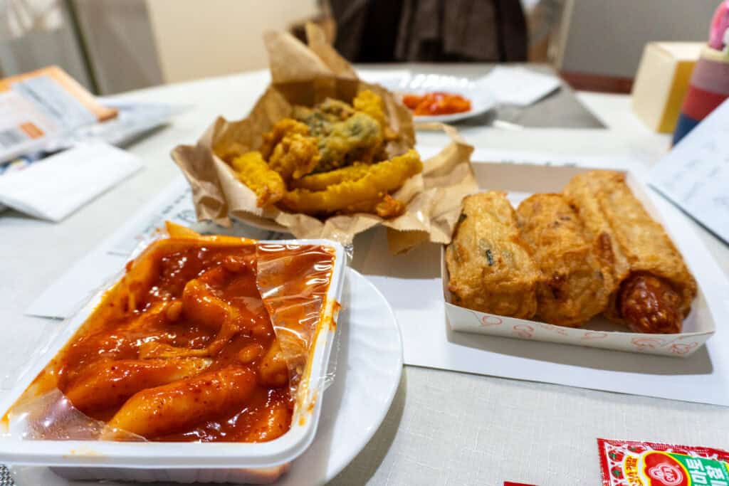 tteokbokki and assorted fried side dishes